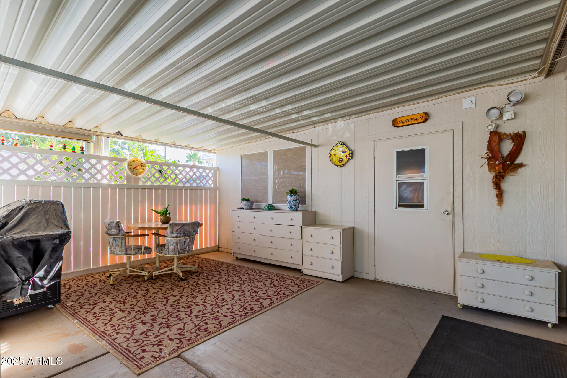 2400 East Baseline Avenue, Unit 148 Apache Junction, AZ 85119 - Photo 5 of 42 a living room with furniture and a table
