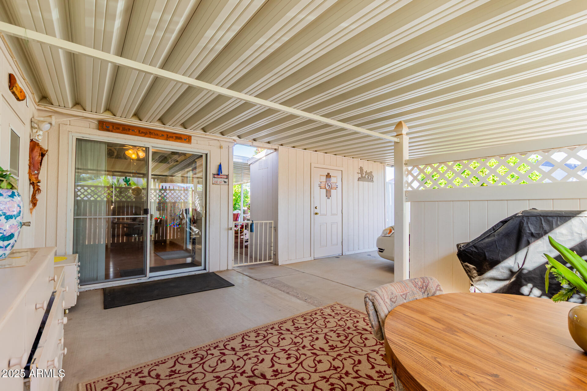 2400 East Baseline Avenue, Unit 148 Apache Junction, AZ 85119 - Photo 6 of 42 a bedroom with a bed and a window