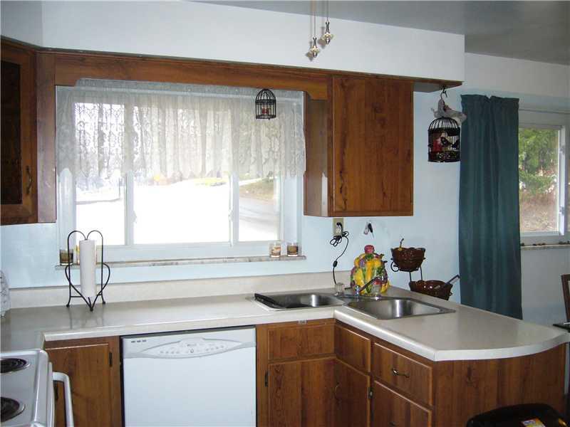 3010 Brodhead Road Aliquippa, PA 15001 - Photo 2 of 12 Kitchen. Kitchen steps in from side porch, open to dining area.
