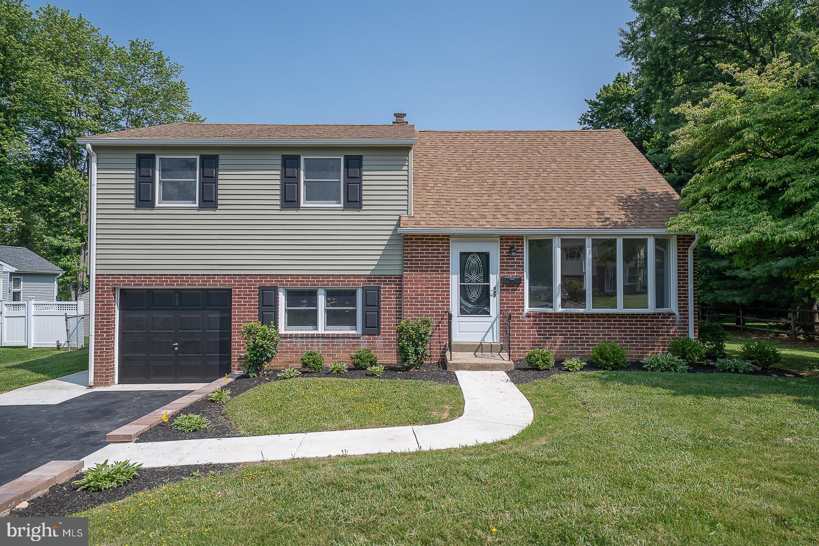 503 Poplar Road Flourtown, PA 19031 - Photo 2 of 63 a view of a house with a yard and plants