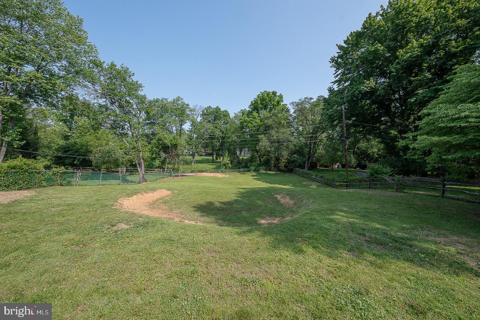 503 Poplar Road Flourtown, PA 19031 - Photo 54 of 63 a view of a field with trees in the background