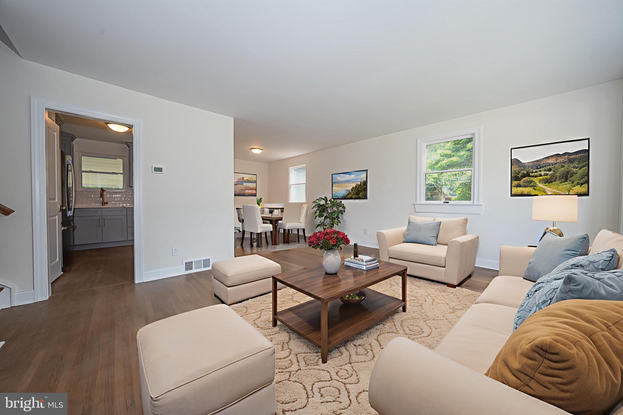 503 Poplar Road Flourtown, PA 19031 - Photo 6 of 63 a living room with furniture and a large window