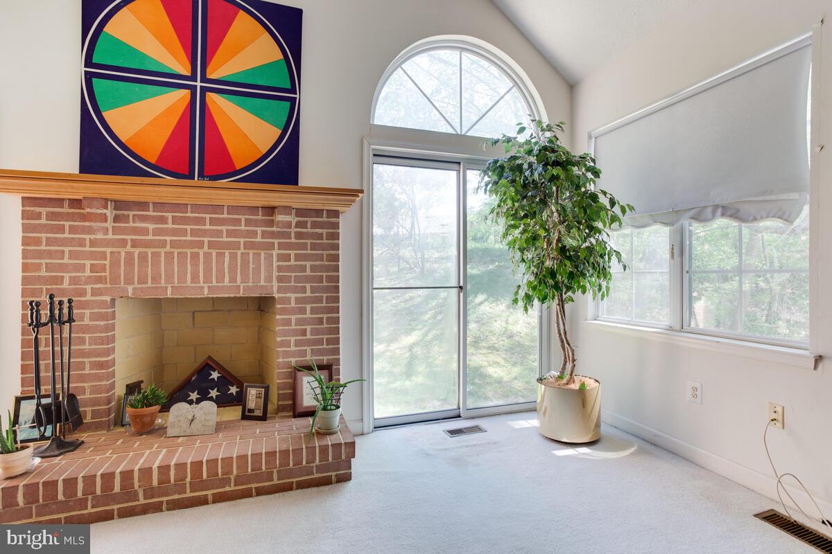 11601 Trillum Street Bowie, MD 20721 - Photo 35 of 36 Brick and Mantled Fireplace in Family Rm