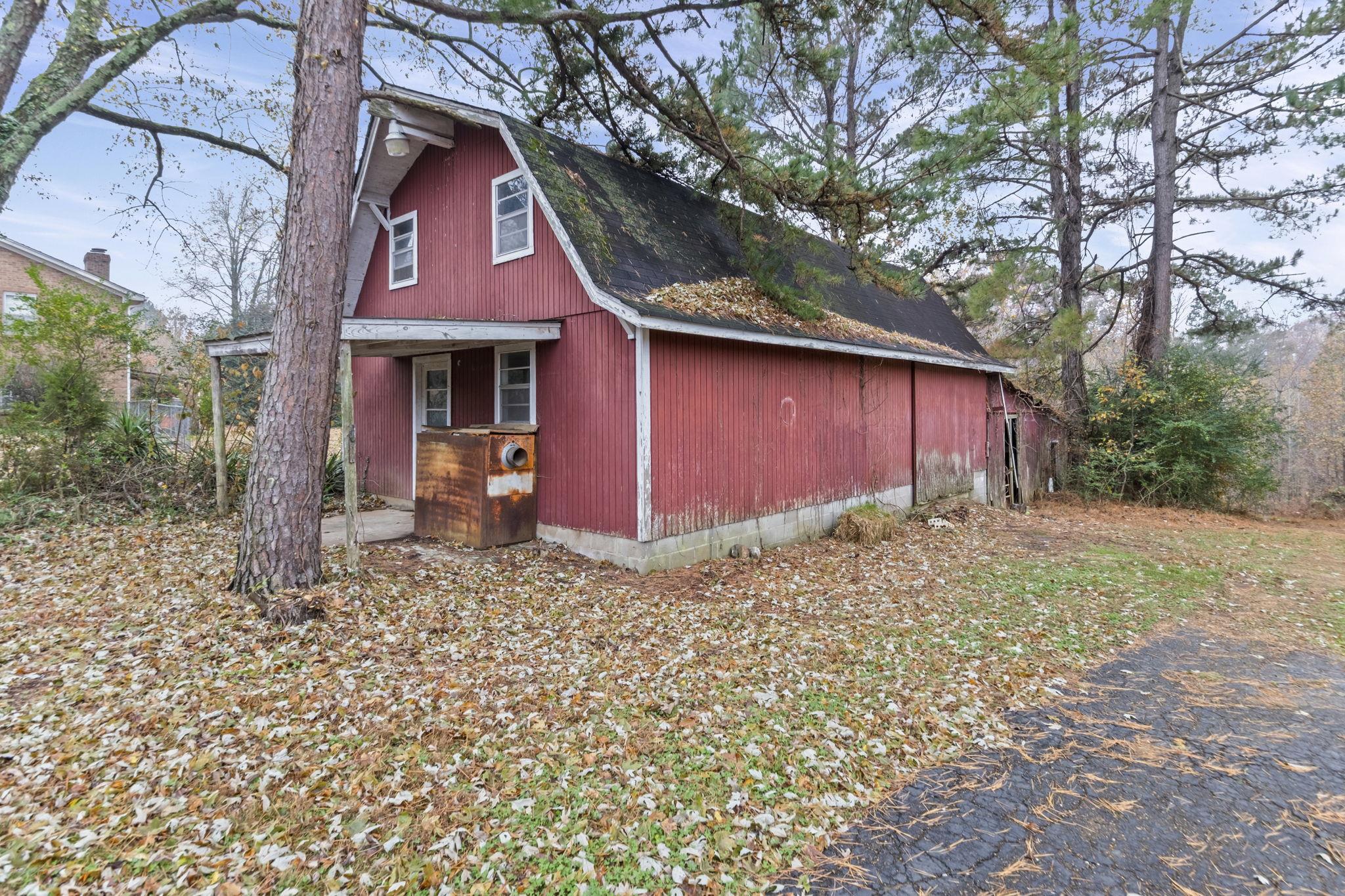 835 Curve Woodville Road Gates, TN 38037 - Photo 28 of 33 a view of a house with a yard