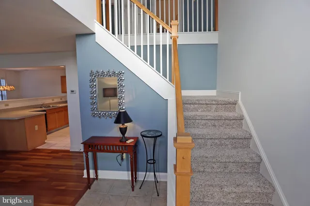 a living room with furniture fireplace and a flat screen tv