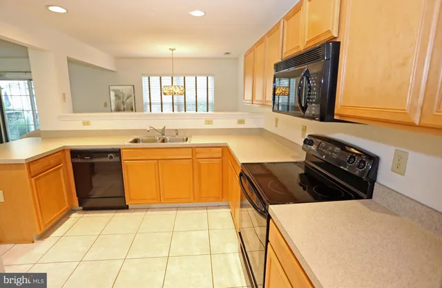 a bathroom with a sink double vanity and a mirror