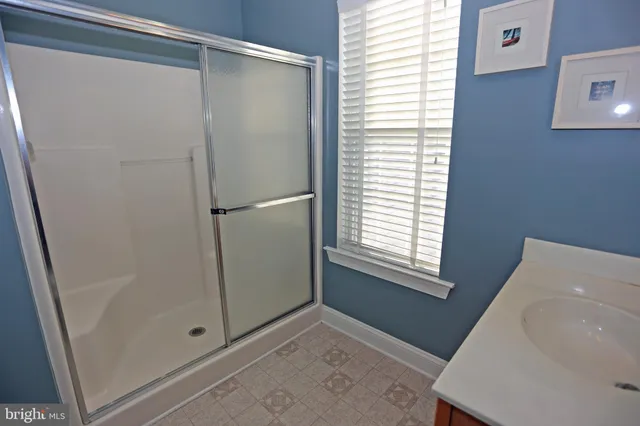 a view of a hallway with windows