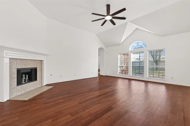 a view of a lake with houses in the back