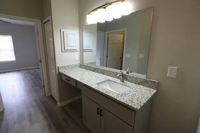 a bathroom with a toilet and a sink