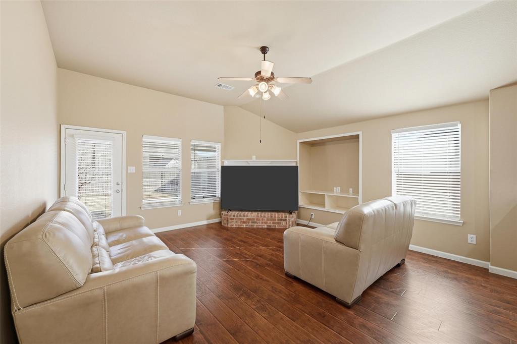 910 Fulbourne Drive Anna, TX 75409 - Photo 11 of 36 Living room with gas fireplace