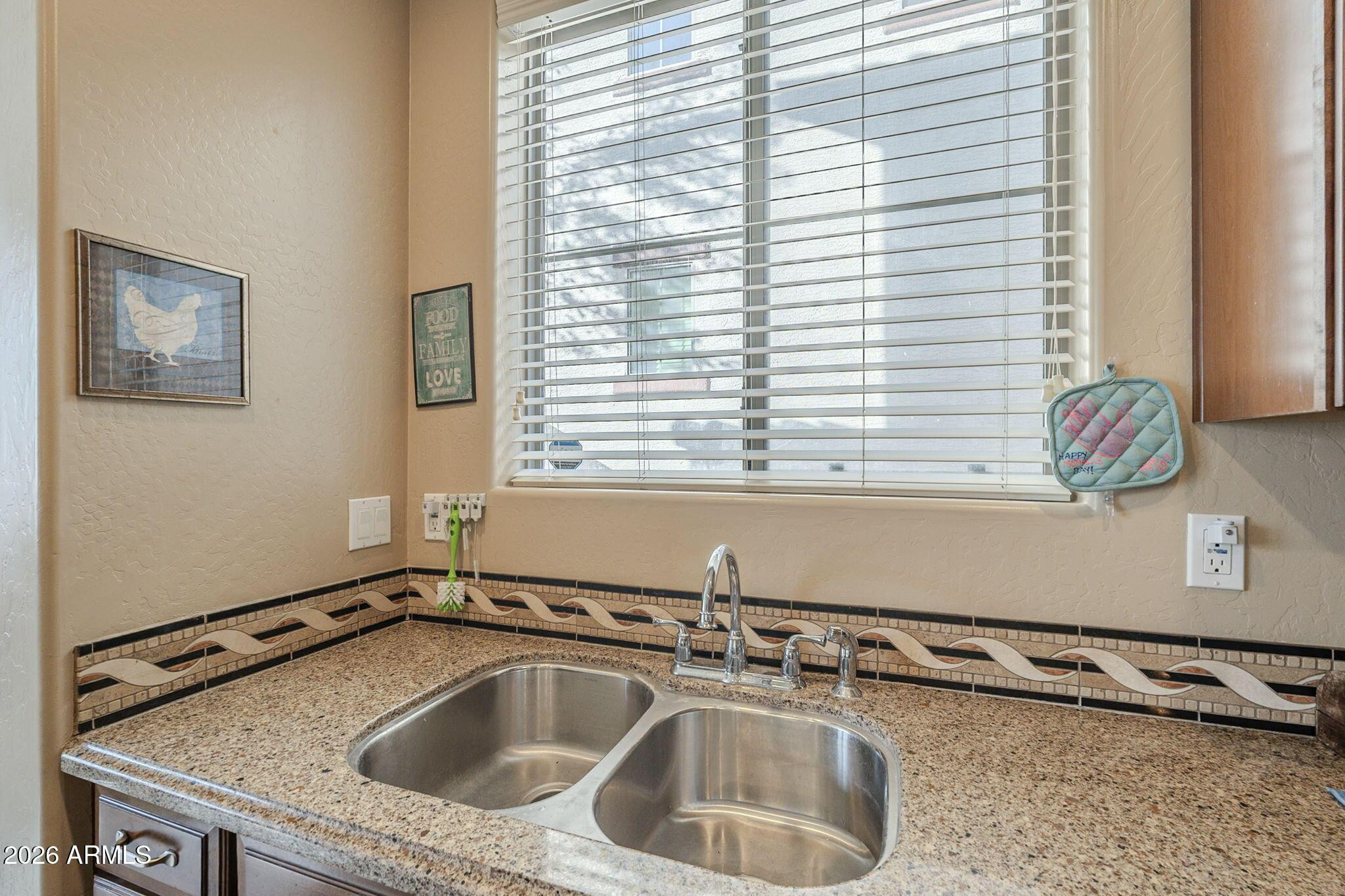 451 South Hawes Road, Unit 45 Mesa, AZ 85208 - Photo 12 of 36 a close view of a sink and a window