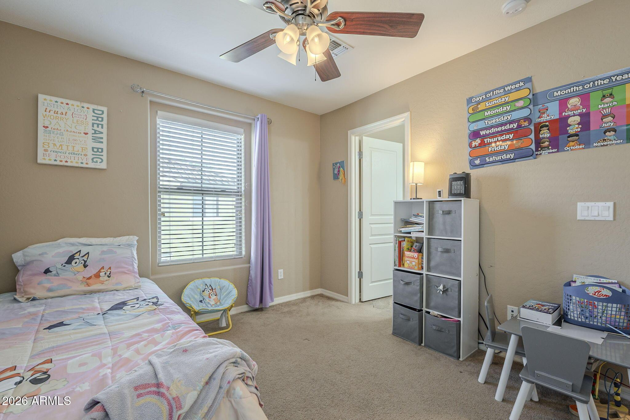 451 South Hawes Road, Unit 45 Mesa, AZ 85208 - Photo 21 of 36 a bedroom with a bed and a window
