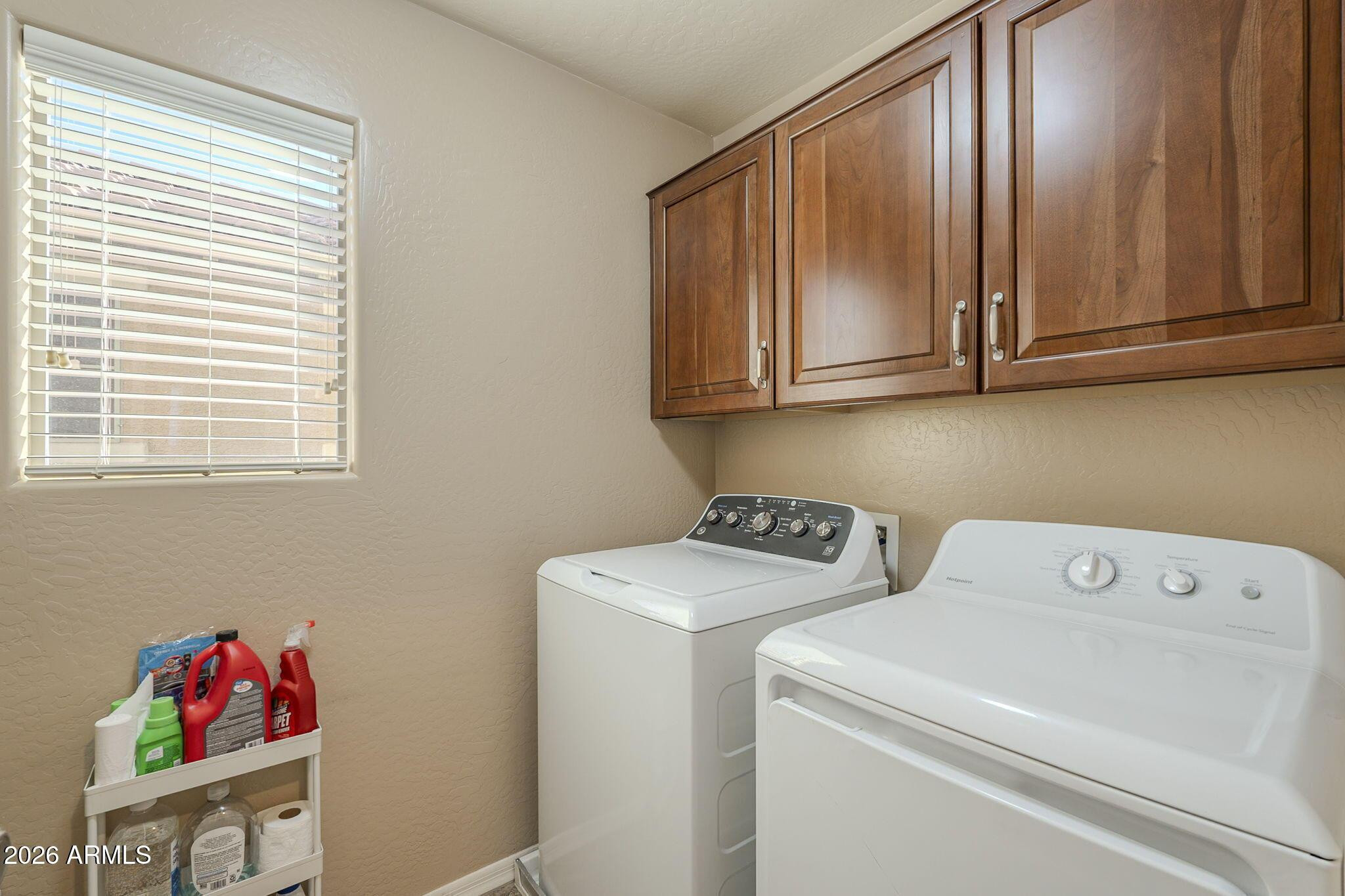 451 South Hawes Road, Unit 45 Mesa, AZ 85208 - Photo 33 of 36 a utility room with dryer and washer