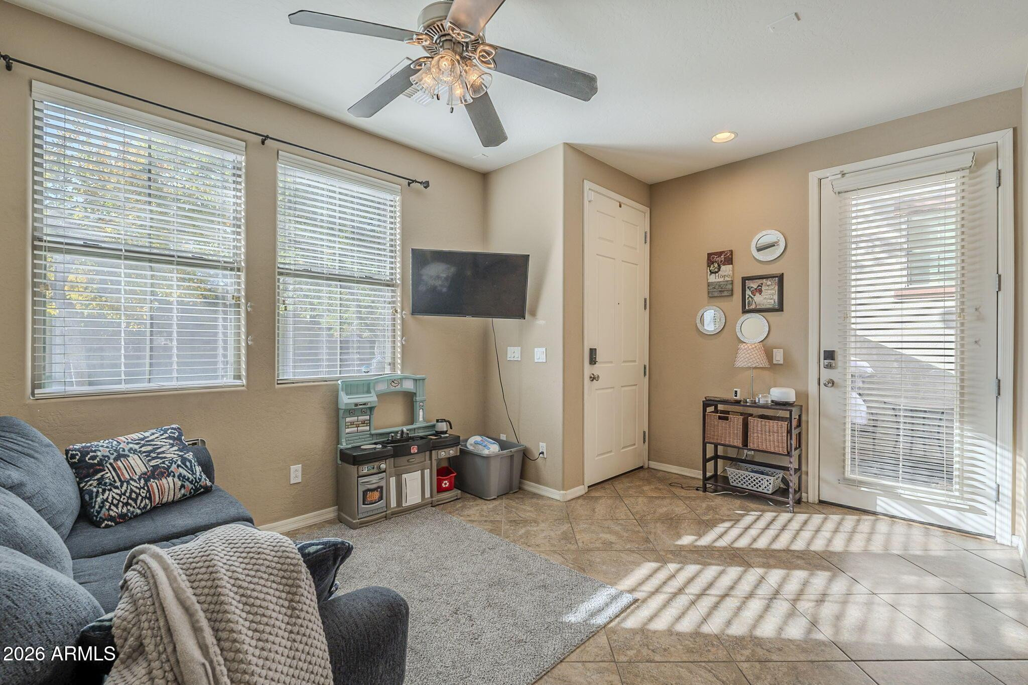 451 South Hawes Road, Unit 45 Mesa, AZ 85208 - Photo 5 of 36 a bedroom with furniture and a window