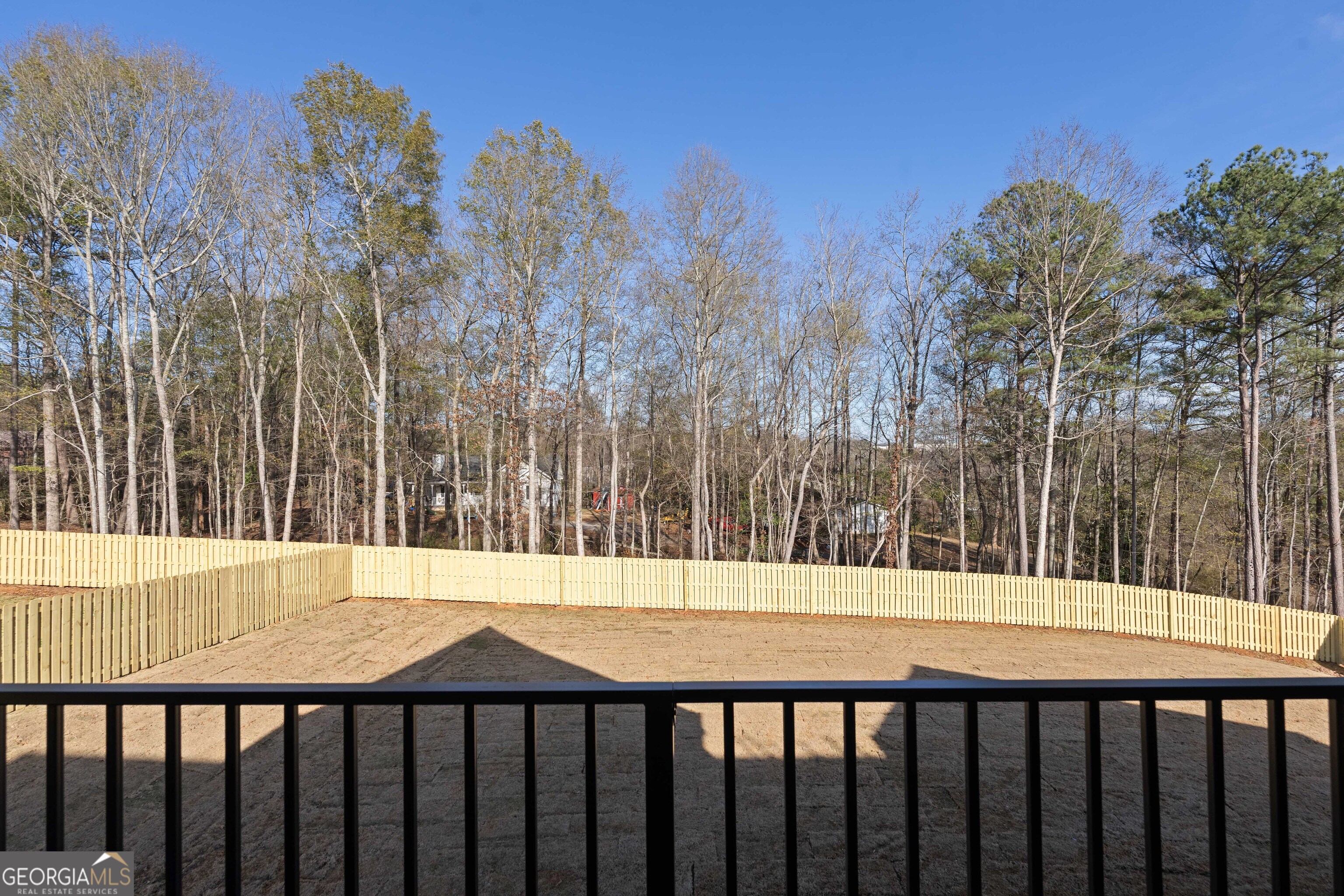 407 Thunder Road Buford, GA 30518 - Photo 113 of 133 a street view from a yard