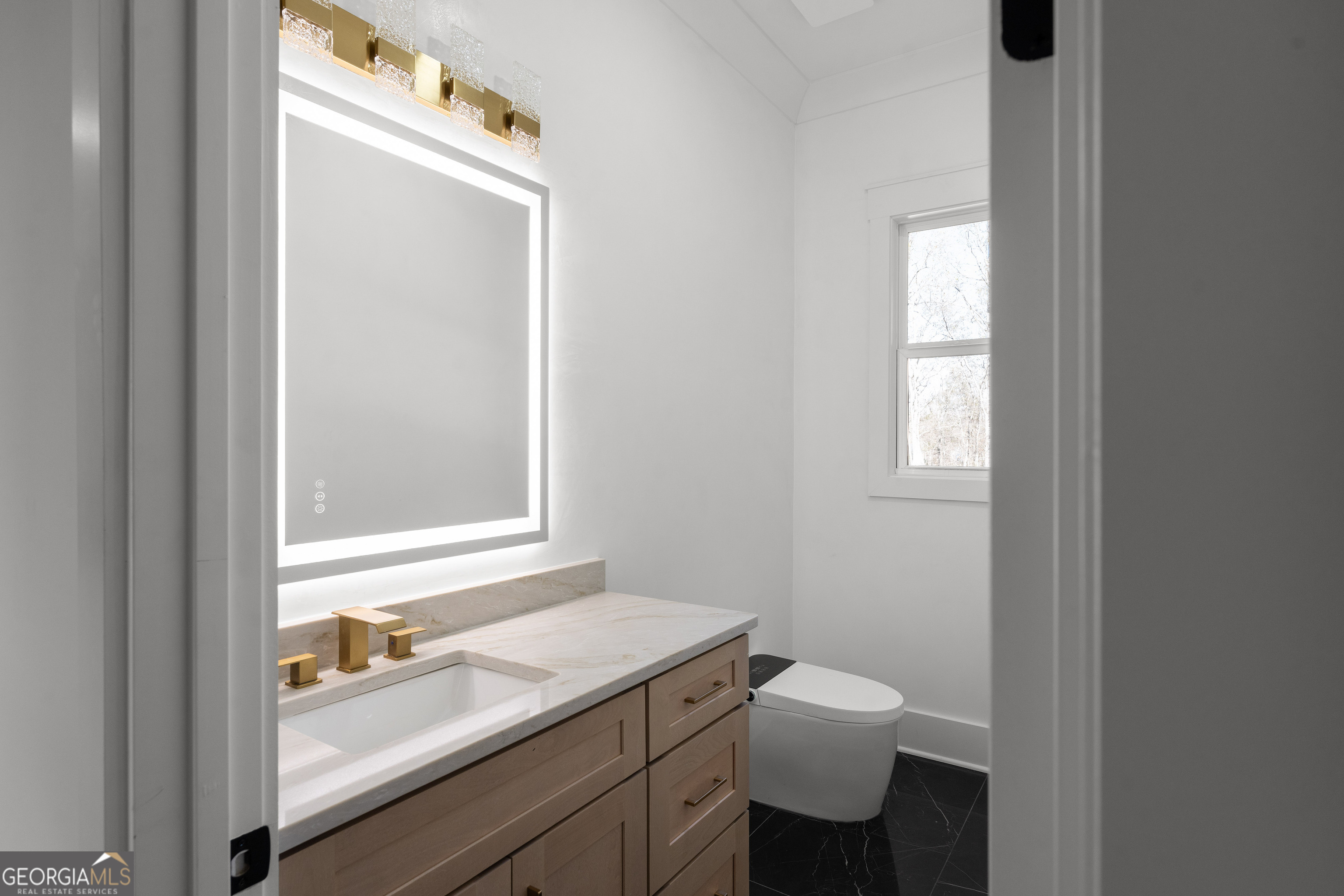 407 Thunder Road Buford, GA 30518 - Photo 117 of 133 a bathroom with a granite countertop sink toilet and a mirror
