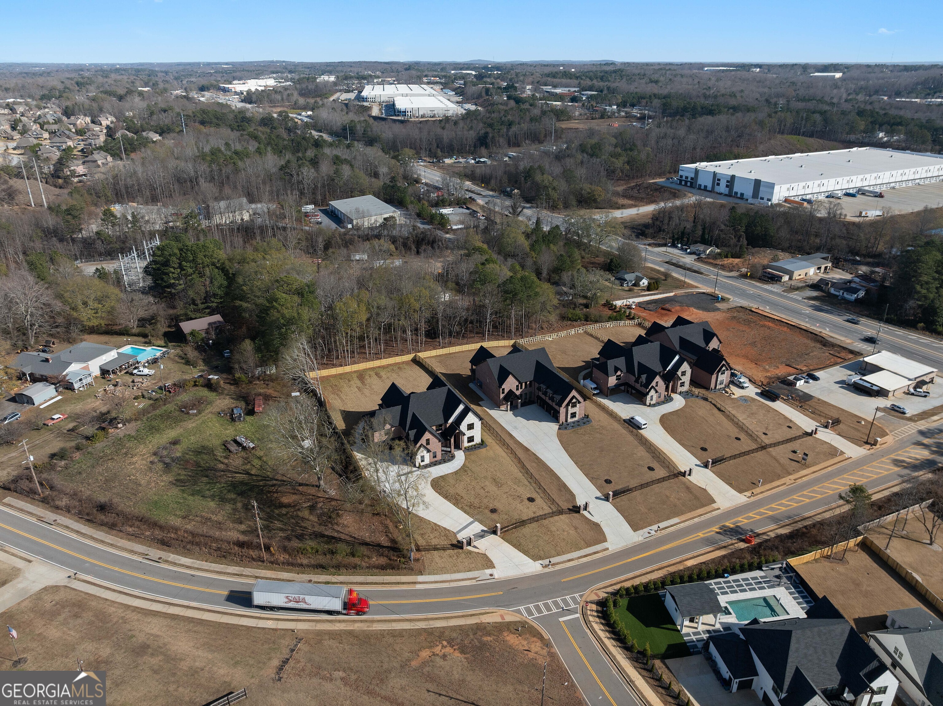 407 Thunder Road Buford, GA 30518 - Photo 128 of 133 an aerial view of a house with a mountain view