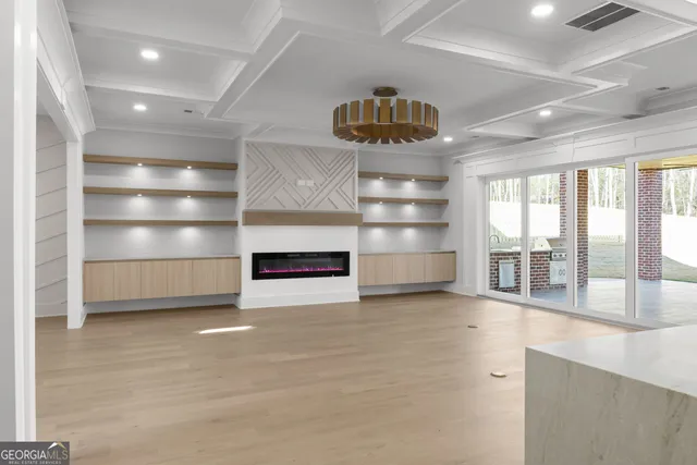 a kitchen with stainless steel appliances granite countertop a stove and a refrigerator