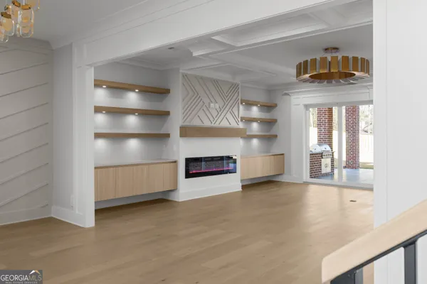 a kitchen with stainless steel appliances granite countertop a stove and a refrigerator