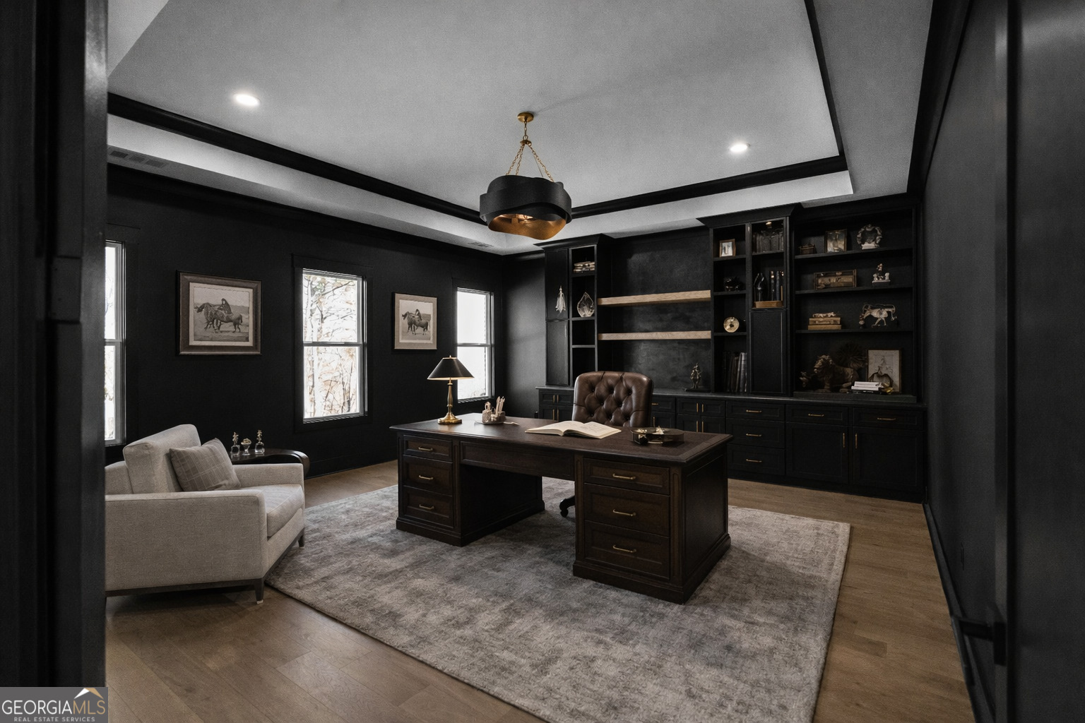 407 Thunder Road Buford, GA 30518 - Photo 3 of 133 a living room with furniture a rug and a chandelier