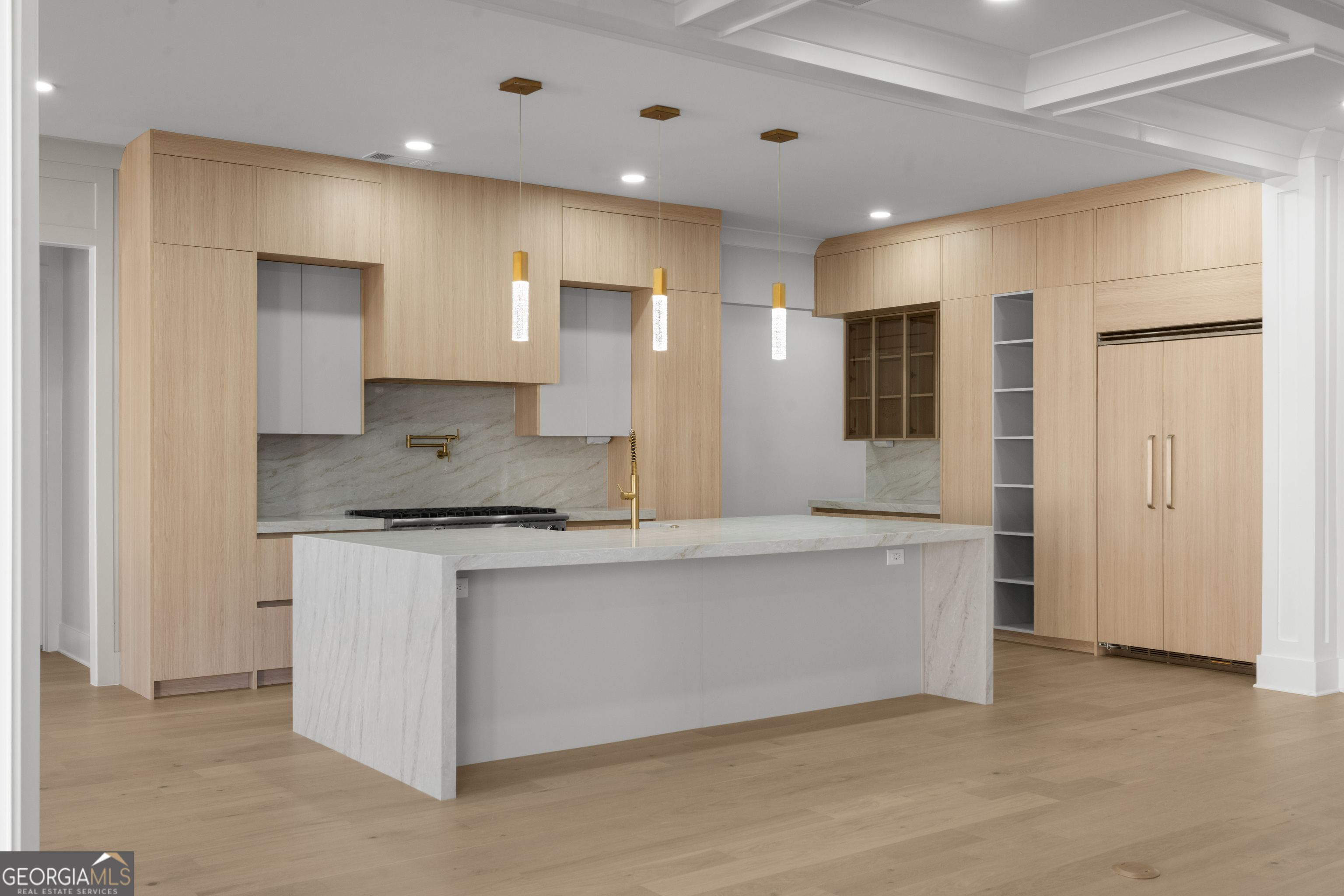 407 Thunder Road Buford, GA 30518 - Photo 33 of 133 a large kitchen with a large counter top sink stainless steel appliances and cabinets