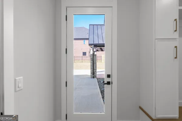 a view of house with a yard