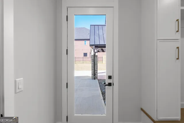 an aerial view of a house with a mountain view