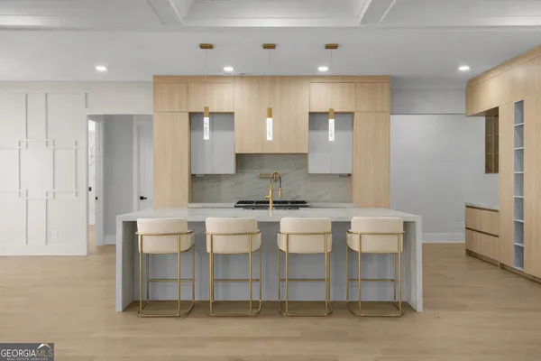 a view of a dining room with furniture and window