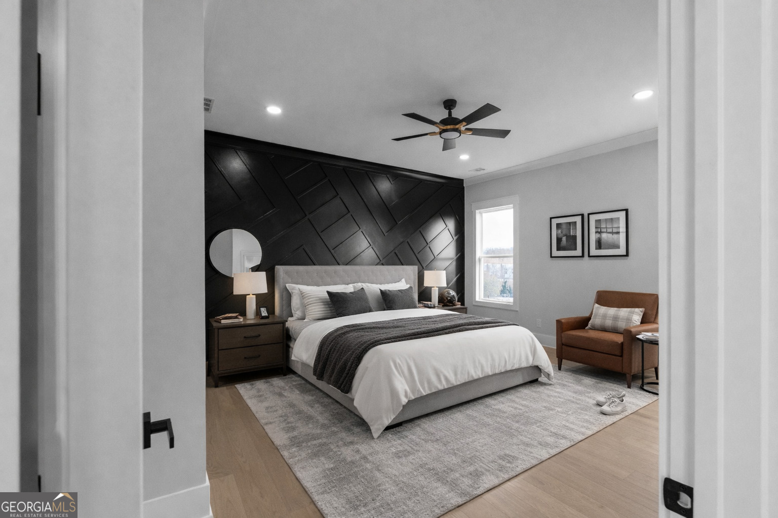 407 Thunder Road Buford, GA 30518 - Photo 8 of 133 a bedroom with a large bed and a chandelier