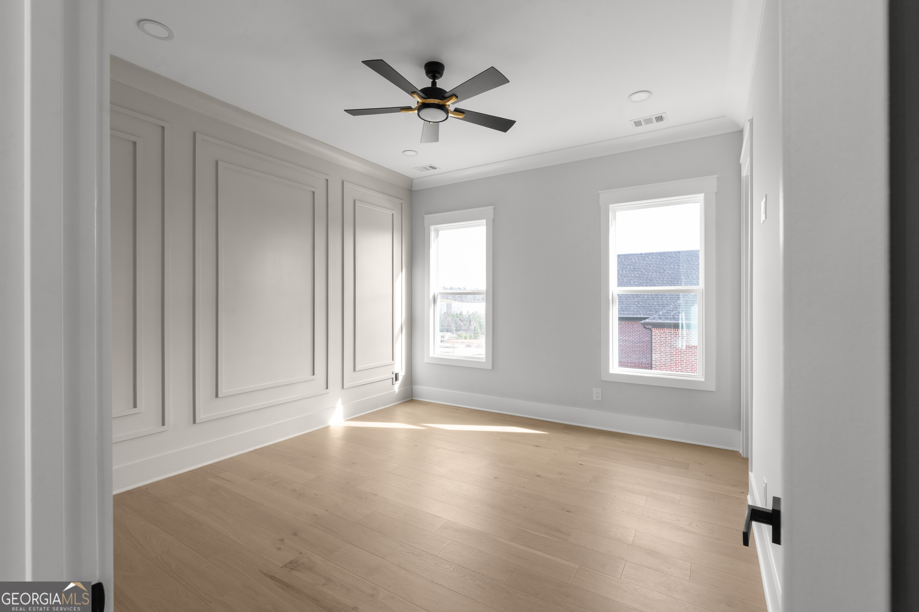 407 Thunder Road Buford, GA 30518 - Photo 92 of 133 a view of a livingroom with a ceiling fan and window