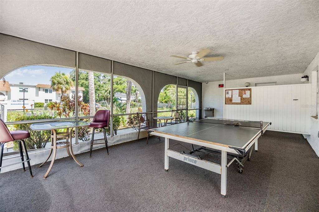 233 South McMullen Booth Road, Unit 43 Clearwater, FL 33759 - Photo 15 of 23 a room with furniture and a large window