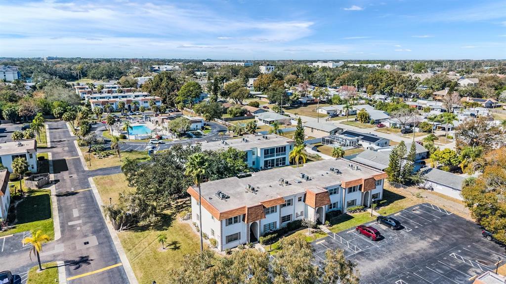 233 South McMullen Booth Road, Unit 43 Clearwater, FL 33759 - Photo 16 of 23 an aerial view of a city with lots of residential buildings