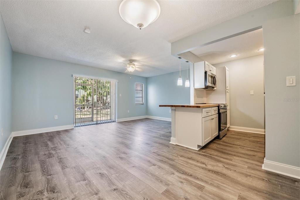 233 South McMullen Booth Road, Unit 43 Clearwater, FL 33759 - Photo 2 of 23 a view of kitchen with cabinets and wooden floor
