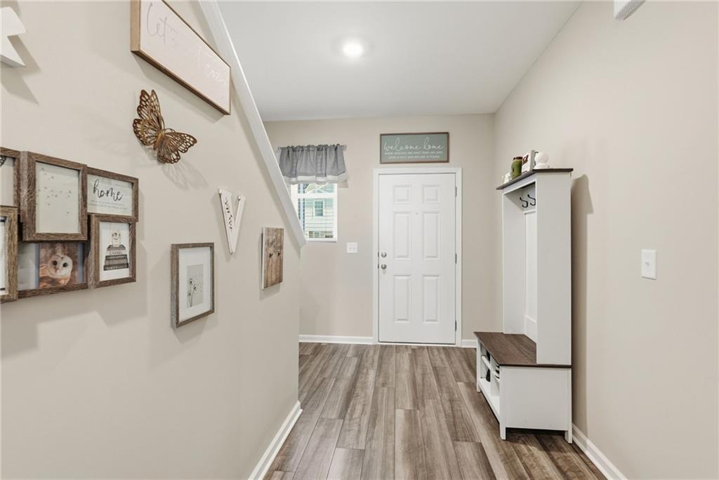 60 Thetford Way Winder, GA 30680 - Photo 13 of 34 a view of a room with cabinet and wooden floor