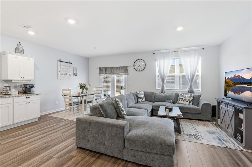 60 Thetford Way Winder, GA 30680 - Photo 9 of 34 a living room with furniture and a large window