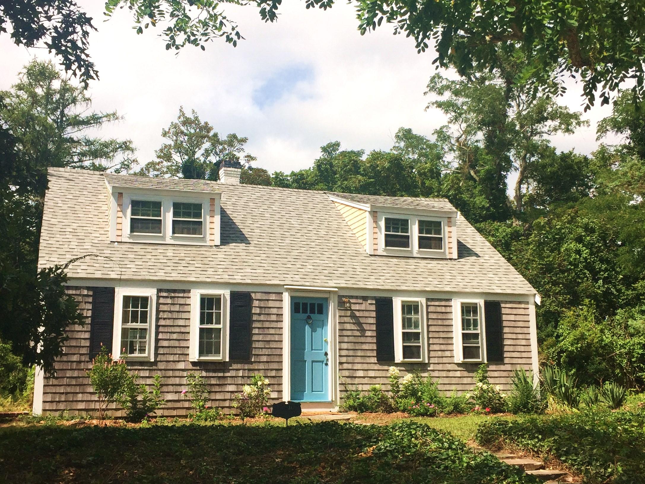 46 Namskaket Road Orleans, MA 02653 - Photo 1 of 35 a front view of a house with a yard