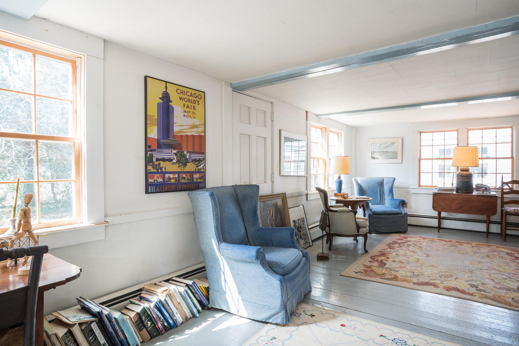 46 Namskaket Road Orleans, MA 02653 - Photo 16 of 35 a living room with furniture and a large window with wooden floor