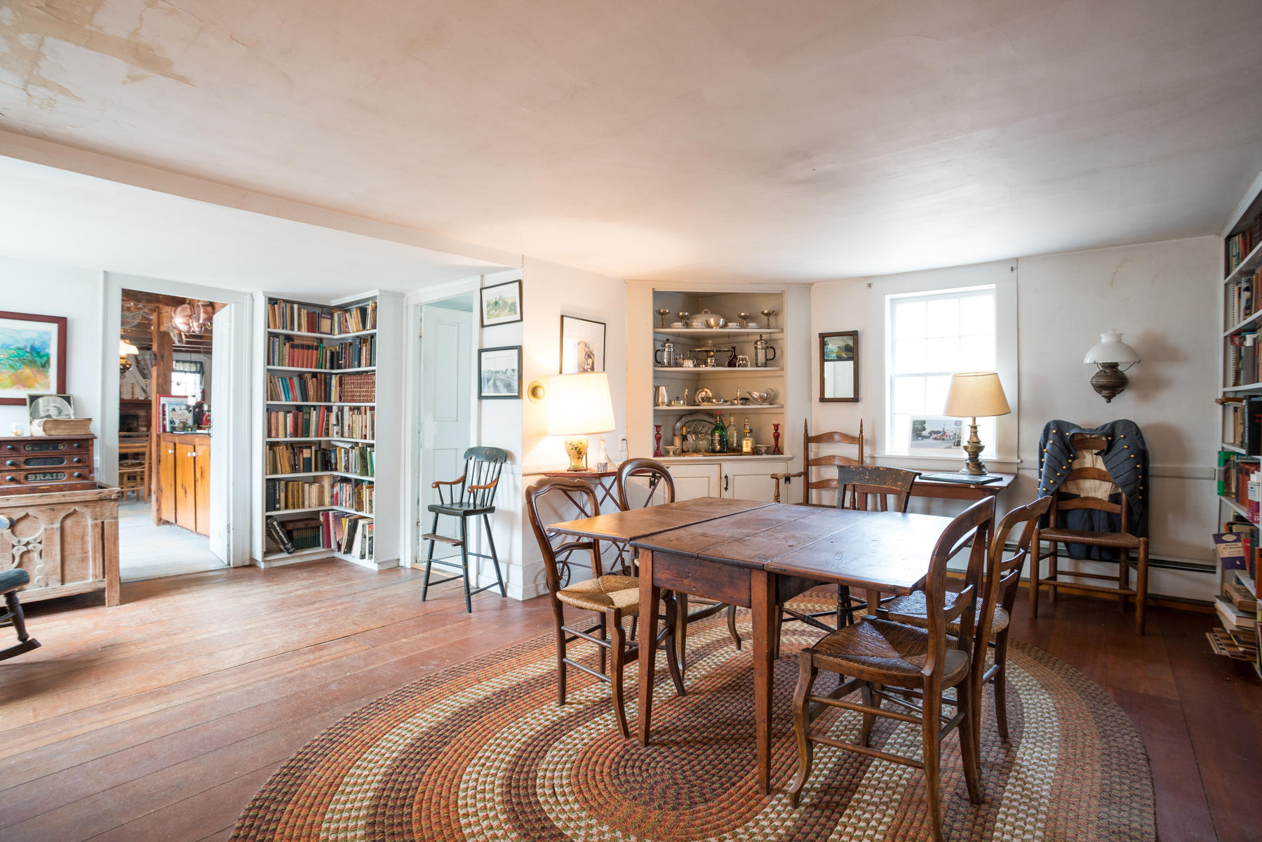 46 Namskaket Road Orleans, MA 02653 - Photo 19 of 35 a dining room with furniture and wooden floor