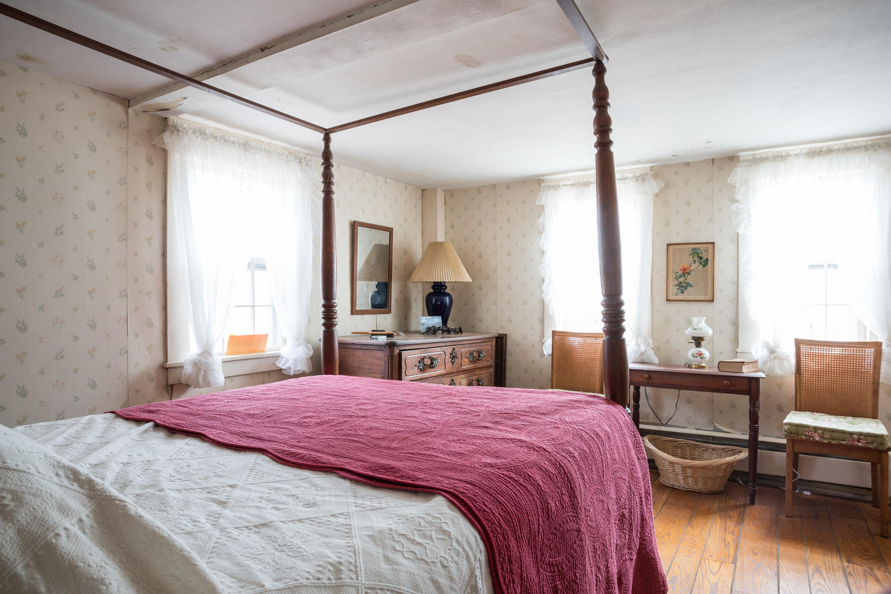 46 Namskaket Road Orleans, MA 02653 - Photo 23 of 35 a bedroom with a bed and a table