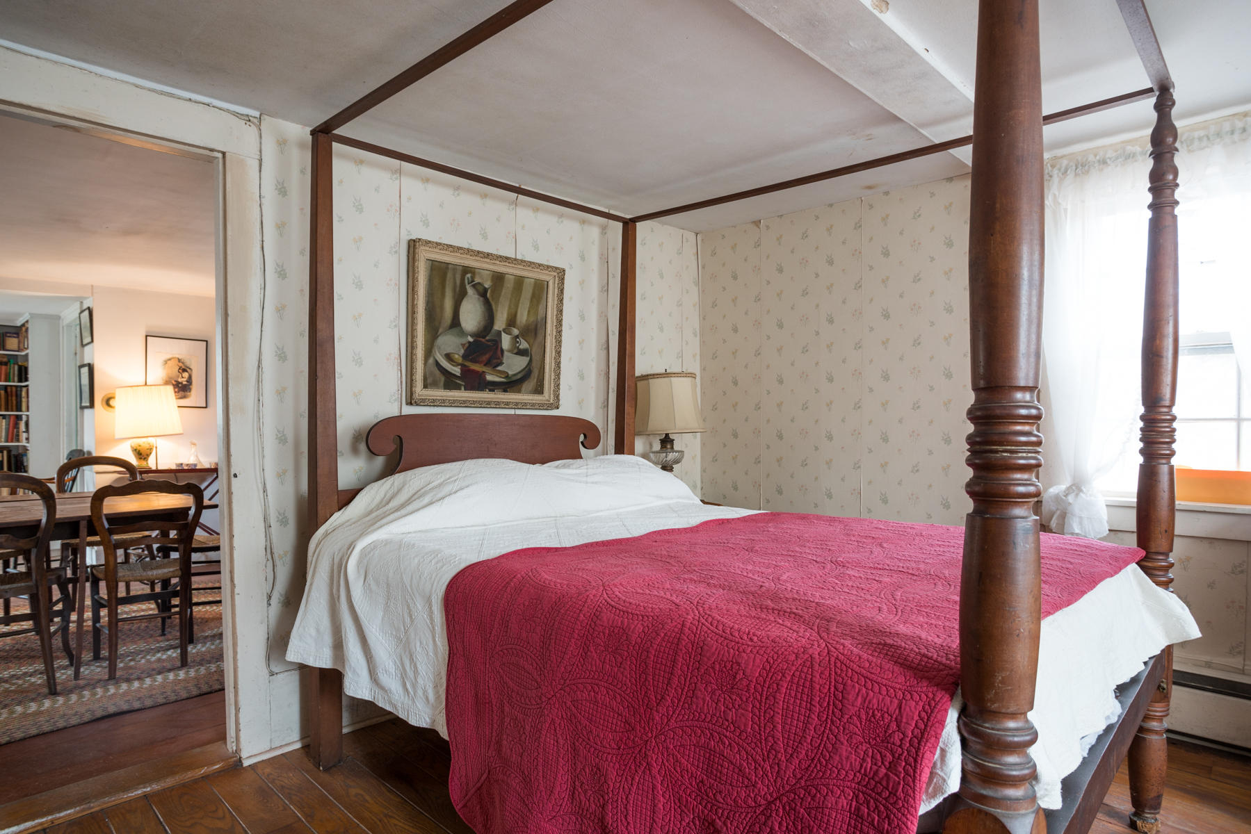 46 Namskaket Road Orleans, MA 02653 - Photo 24 of 35 a bedroom with a bed and a painting on the wall