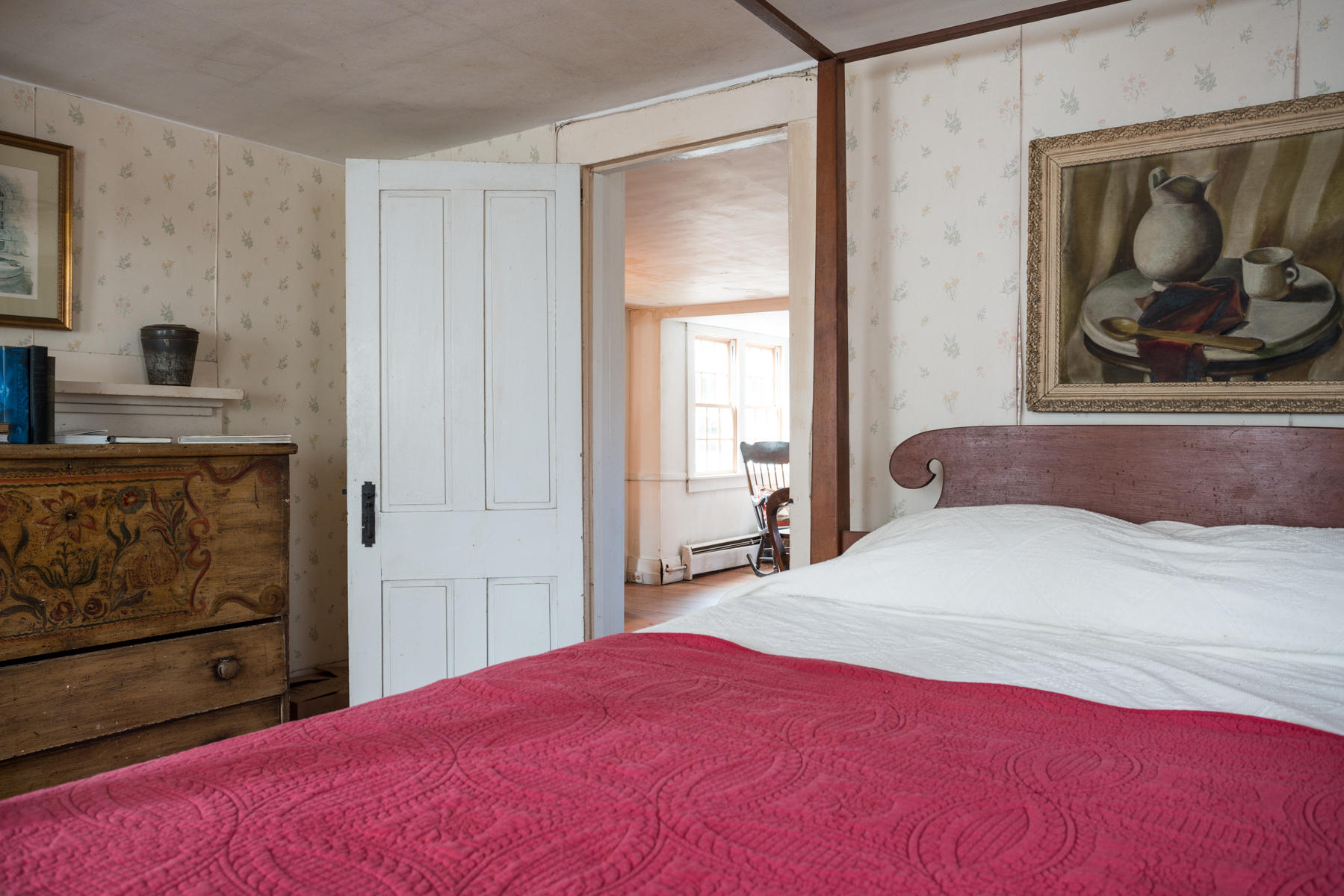 46 Namskaket Road Orleans, MA 02653 - Photo 25 of 35 a bedroom with a bed and a painting on the wall