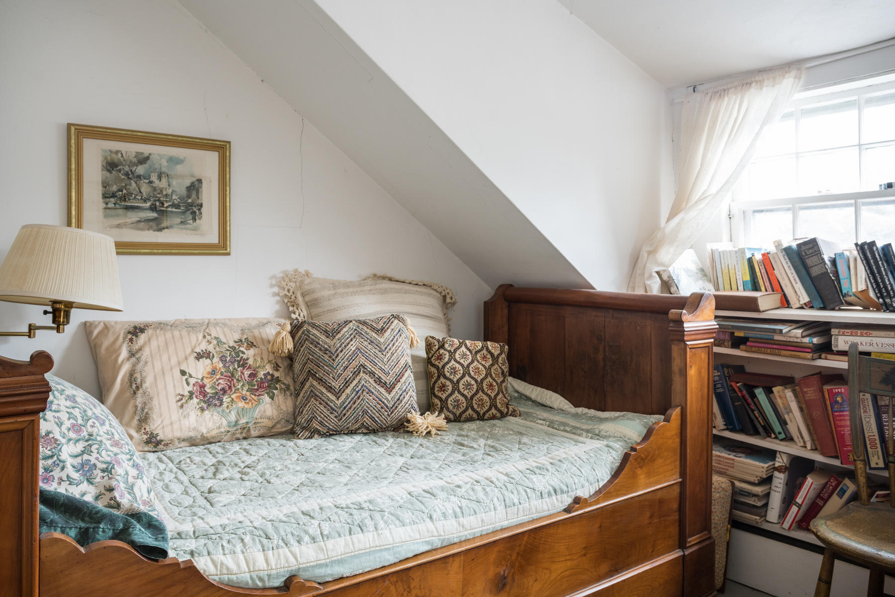 46 Namskaket Road Orleans, MA 02653 - Photo 27 of 35 a bed sitting in a bedroom next to a window