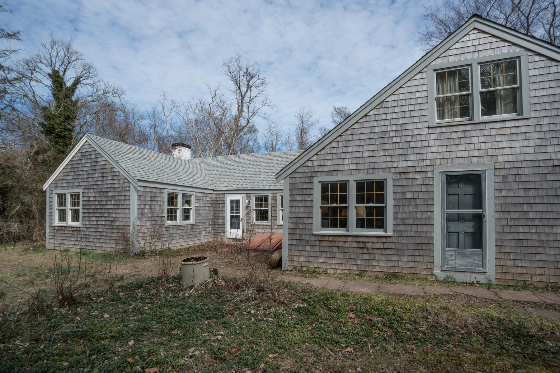 46 Namskaket Road Orleans, MA 02653 - Photo 32 of 35 a house view with a backyard space