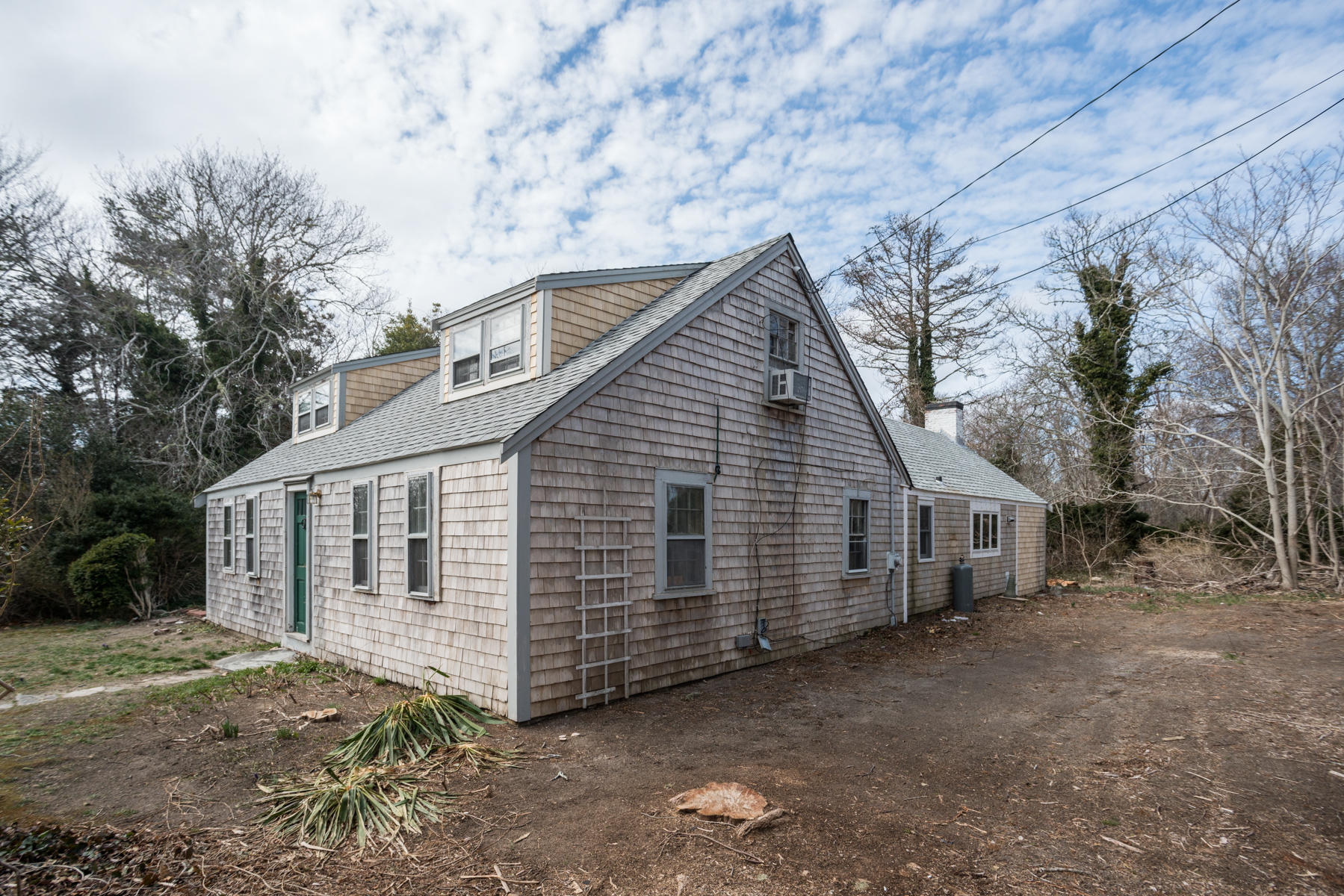 46 Namskaket Road Orleans, MA 02653 - Photo 33 of 35 a view of a house with a yard