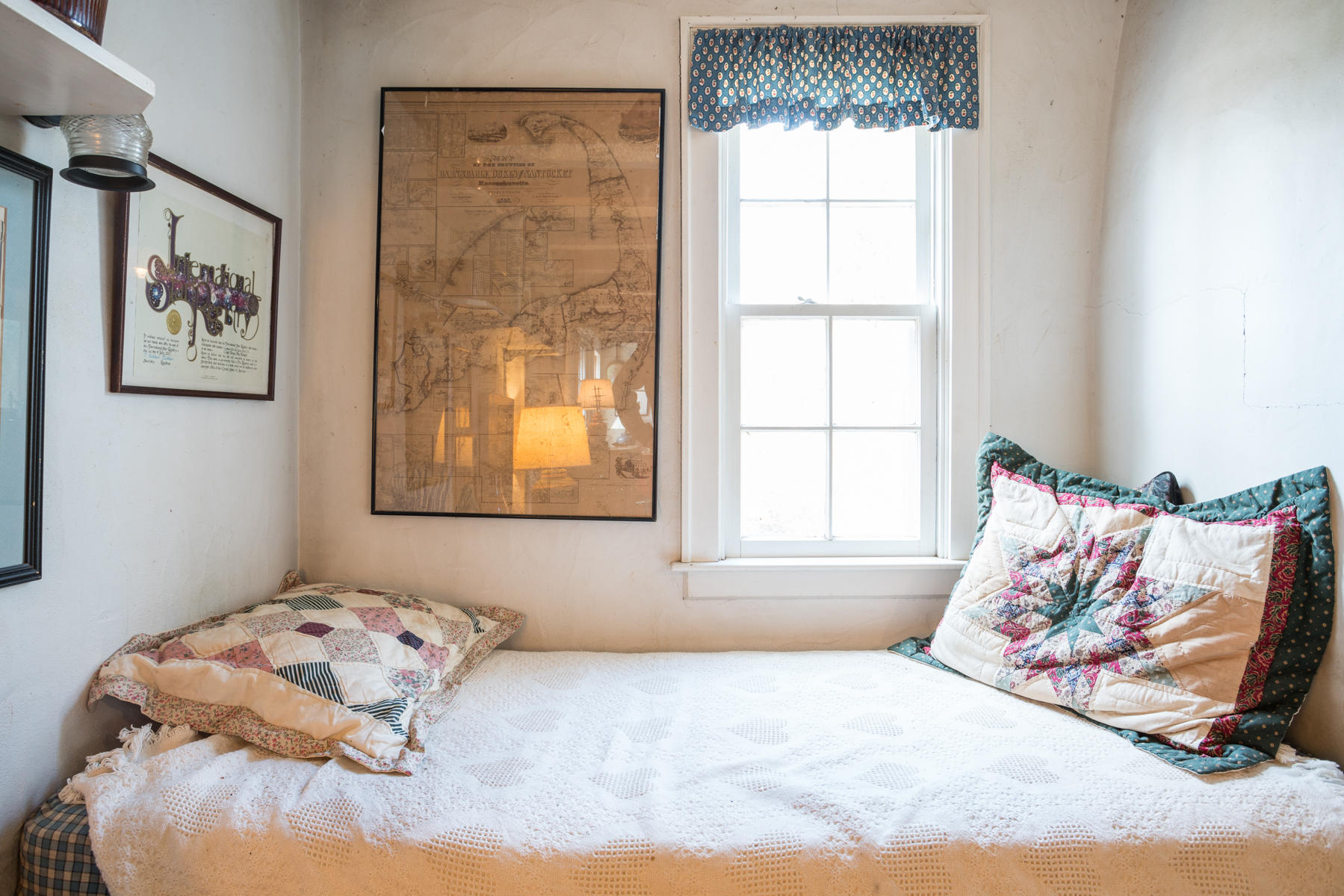 46 Namskaket Road Orleans, MA 02653 - Photo 10 of 35 a bedroom with a bed and window