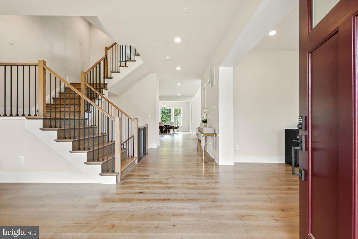 12321 Potomac Hunt Road North Potomac, MD 20878 - Photo 3 of 64 a view of entryway and hall with wooden floor