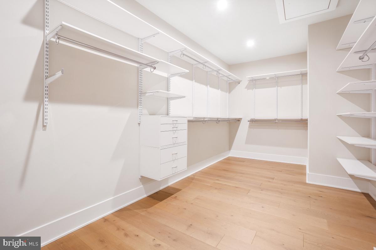 12321 Potomac Hunt Road North Potomac, MD 20878 - Photo 42 of 64 a view of walk in closet with empty racks