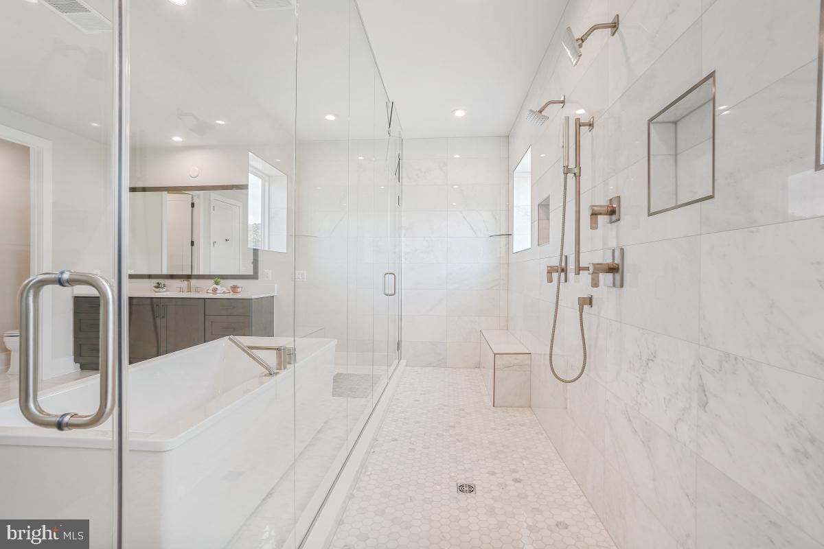 12321 Potomac Hunt Road North Potomac, MD 20878 - Photo 46 of 64 a bathroom with a sink a toilet and shower