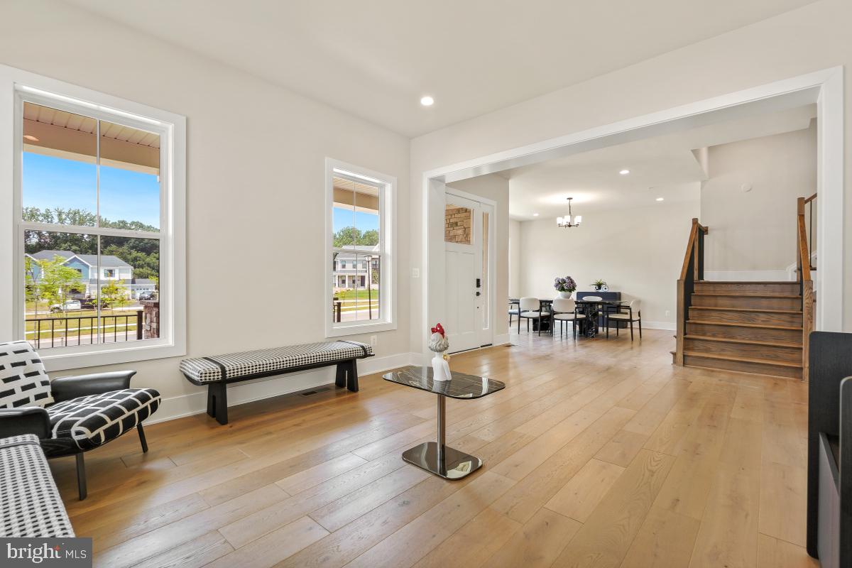 12321 Potomac Hunt Road North Potomac, MD 20878 - Photo 5 of 64 a lobby with furniture and floor to ceiling window