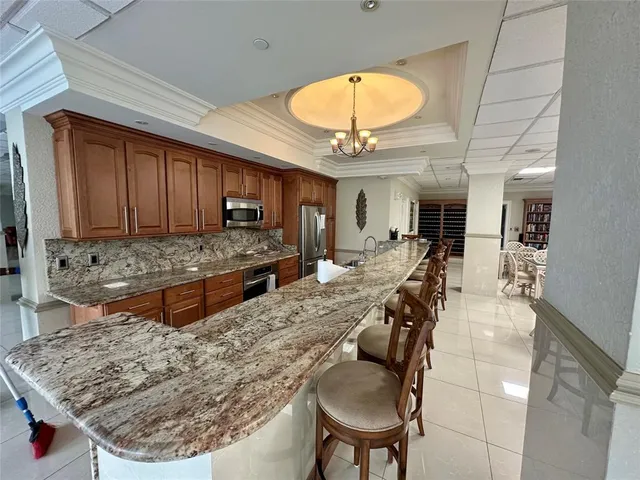 a room with lots of table and chairs